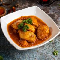 Burmese Style Chicken Curry  · Free range chicken thighs simmered with freshly ground spices. Gluten-free.
