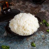 Coconut Rice · Rice soaked in coconut milk.