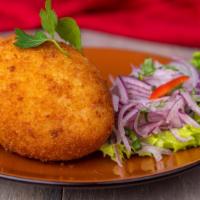 Papa Rellena · Vegetarian. Fried potato stuffed with ground beef or veggies, onion, and hard boiled egg.