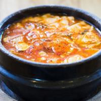 Soft Tofu Stew · Soft tofu with mushroom, zucchini, and onion. Served spicy, mild or non-spicy. Choose beef &...