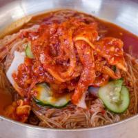 Mool Naengmyeon · Sliced beef and pickled daikon served in cold beef and ginger consomme. Noodles served in co...