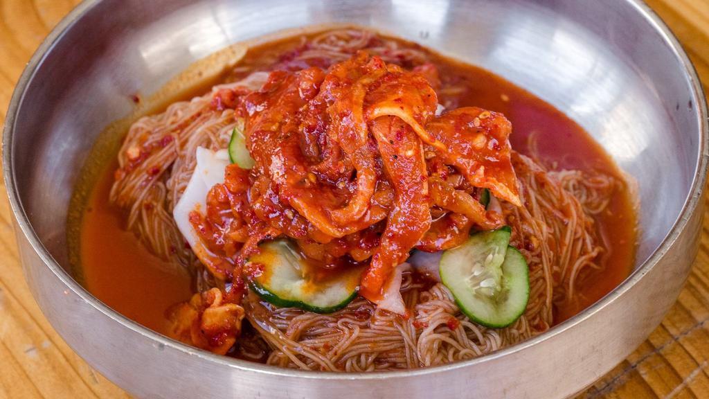 Mool Naengmyeon · Sliced beef and pickled daikon served in cold beef and ginger consomme. Noodles served in cold broth.