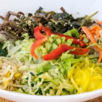 Bibimbop · A bed of bean sprouts, spinach, mushroom, and julienned carrots served over rice and sesame ...