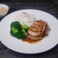 CC11. Chiu Chow Braised Free Range Duck Over Rice 鹵水鴨飯 · Served with seasonal vegetable and a bowl of broth.