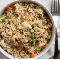 Combination Fried Rice · Wok fried rice blended with eggs, scallions, prawns, chicken and pork.
