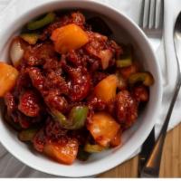 Sweet and Sour Chicken · Deep fried chicken strips stir fried with pineapples, bell peppers and onions in sweet and s...