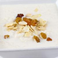 Kheer · Dessert made from basmati rice cooked with sugar, milk and served cold with almonds and pist...