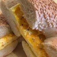 Egg and Cheese Bagel · Two scrambled eggs and cheese on a bagel.
