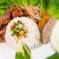 45. Com Tam Bi Cha Thit Nuong · BBQ Pork, Shredded Pork, Egg Cake over Broken Rice. Served with our famous dipping sauce.
