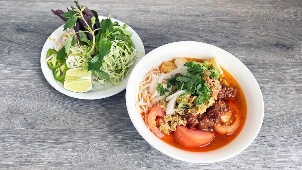 23a. Bun Rieu Oc · Vermicelli Noodles Soup with Shrimp Egg and Sea Snail