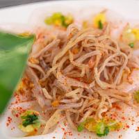 8. Banh Beo · Steamed rice cake topped with shrimp bits, mung bean and green onions, served with shredded ...