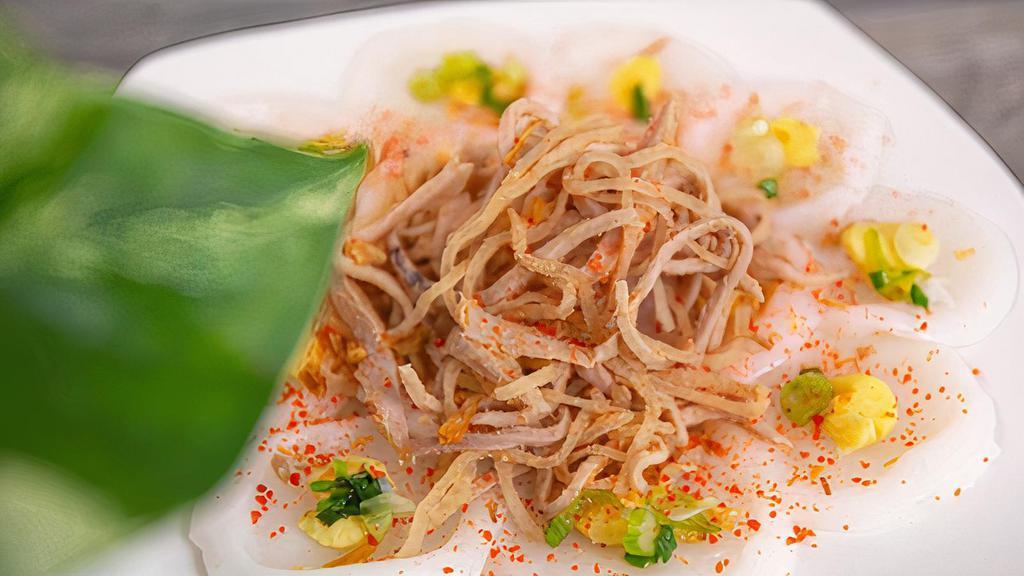 8. Banh Beo · Steamed rice cake topped with shrimp bits, mung bean and green onions, served with shredded pork and our famous house dipping sauce.