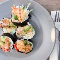 Shrimp Tempura Roll · With cucumber, avocado tobiko and eel sauce.