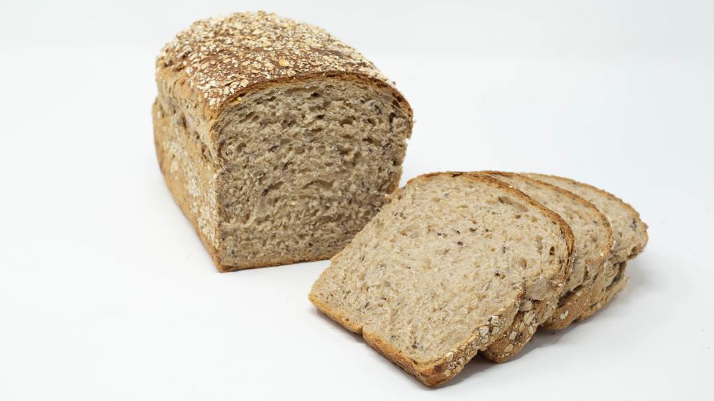 Whole Grain · A Nutty, Healthy, & Slightly Sweet Whole Grain Pullman Loaf. Topped and Mixed with Our Special Blend of Sunflower, Sesame, and Flax Seeds.