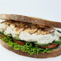 Chicken Salad Sandwich · Chicken salad,  sliced almonds, tomato, cucumber, lettuce, mustard aioli