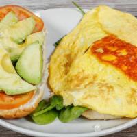 Breakfast Sandwich · Egg, cheese, avocado, tomato, mixed salad with hummus spread