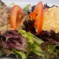 House Salad · Mixed salad with tomato, onions, azifa & buticha . With Gluten free injera!