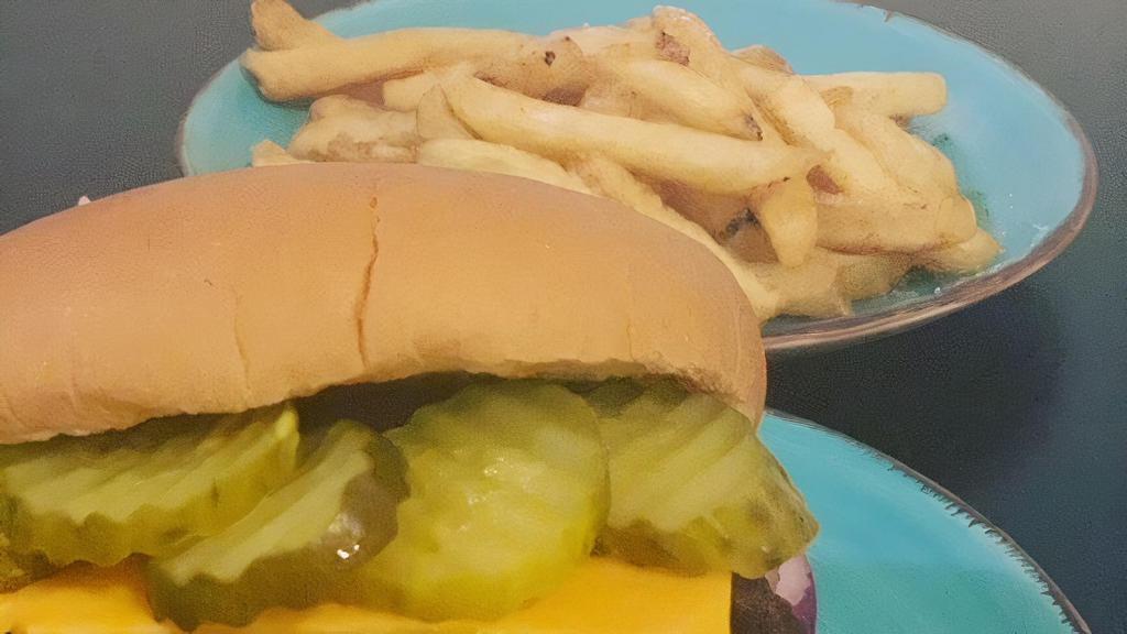 Signature Beef cheeseburger · Cheddar or swiss or pepper jack or bleu cheese