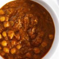 Chana Masala · Garbanzo beans cooked with tomatoes, onions and spices. Served with rice.