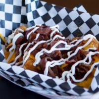 Loaded Tots · Cheez Whiz, Bacon, Sour Cream.