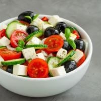 My Big Fat Greek Salad · Fresh salad made of romaine lettuce, tomatoes, cucumber, onion, feta cheese, black olives, p...