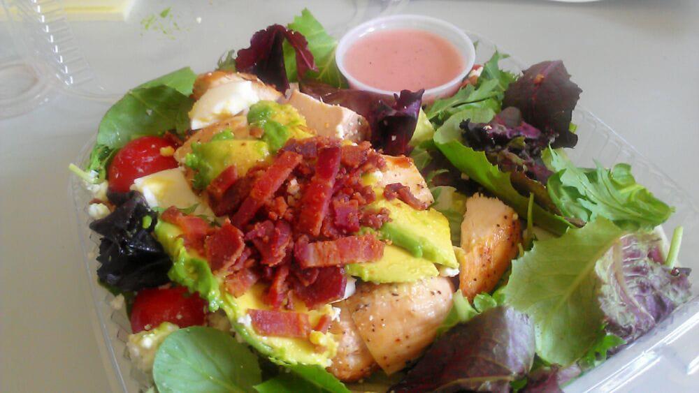 Chop Salad · Bacon, egg, blue cheese, grilled chicken, avocado, tomato, lemon dressing.