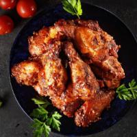 Bbq Chicken Wings · Fresh wings crisp to perfection tossed in bbq sauce.