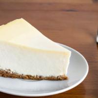 New York Cheesecake · One slice of homemade new york style cheesecake.