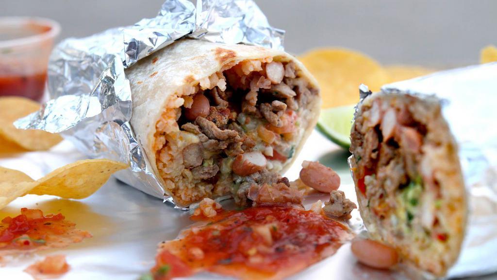 California Burrito · Flour tortilla filled with beans, avocado, Jack and Cheddar cheeses, rice, lettuce and fresh salsa.