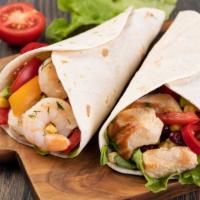Los Cabos Shrimp Burrito · Perfectly grilled shrimp with salsa, fire-roasted fajita veggies, rice, cheese, cabbage, sou...