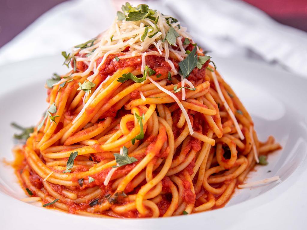 Spaghetti · Our Classic Favorite! Vegan marinara sauce with fresh parmesan cheese  on the side (please note: adding balls here is LESS cost effective than ordering spaghetti with 3 meatballs :))