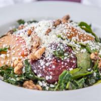 Beet and Goat Cheese Salad · Roasted Beet Salad with mixed greens,  Goat Cheese and and candied walnuts with a Balsamic V...