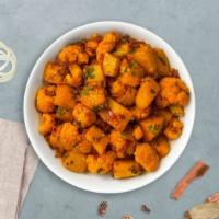 Gobi 65 · Cauliflower marinated with south Indian spices and deep fried.