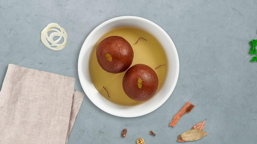 Gulab Jamun · Flavorful balls made of Flour fried and dipped in sugar syrup. Delicacy from India.