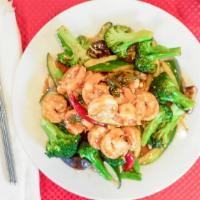 47. Mongolian Prawns · Spicy. Stir fried prawns, broccoli, mushrooms, snow peas, red pepper, onions and basil leave...