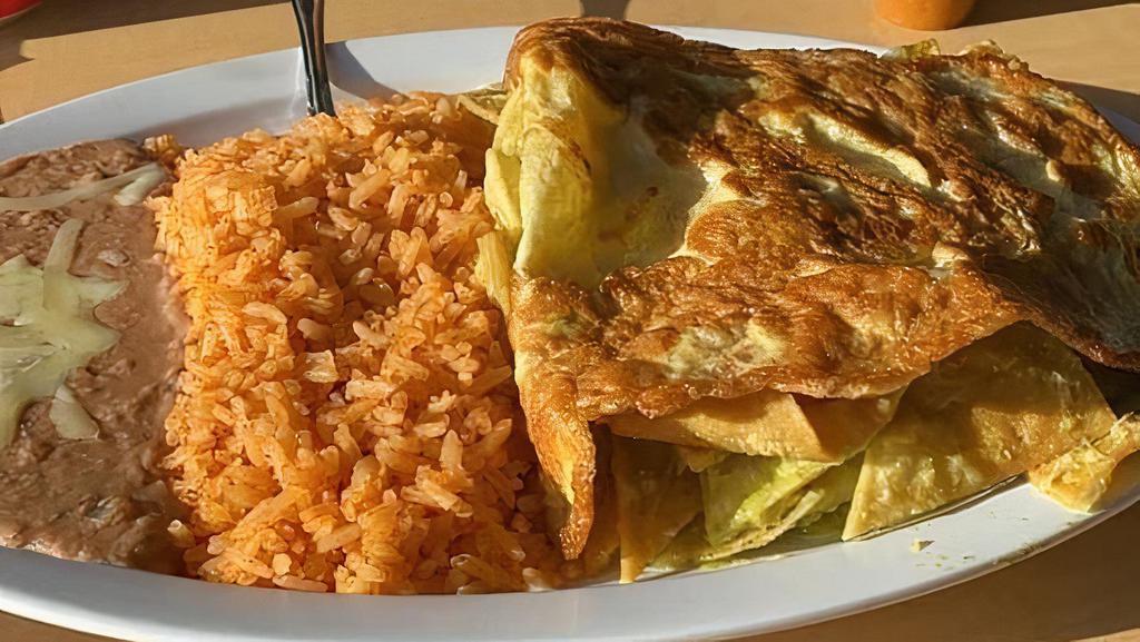 Green Chilaquiles · Rice, Refried Beans, Egg