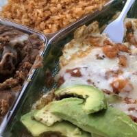 Huevos Rancheros · Rice, Refried Beans, Sauce and Cheese, Tortilla