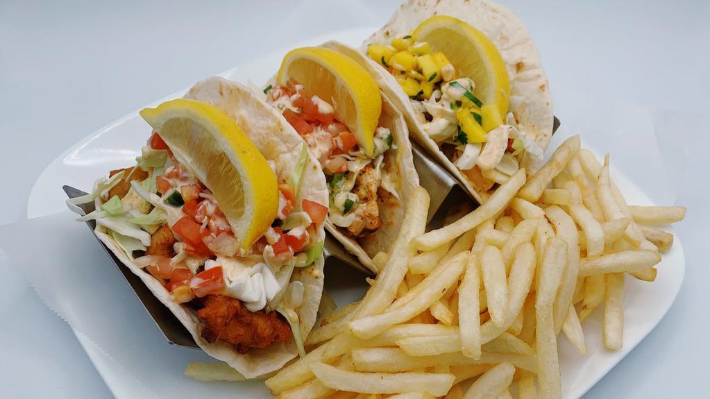 Tres Tacos · Your choice of: fish, shrimp, salmon, beef, or chicken.
Served with pico de gallo,, lettuce,and spicy ranch. Served with fies.
*shrimp taco comes with mango salsa instead of pico de gallo