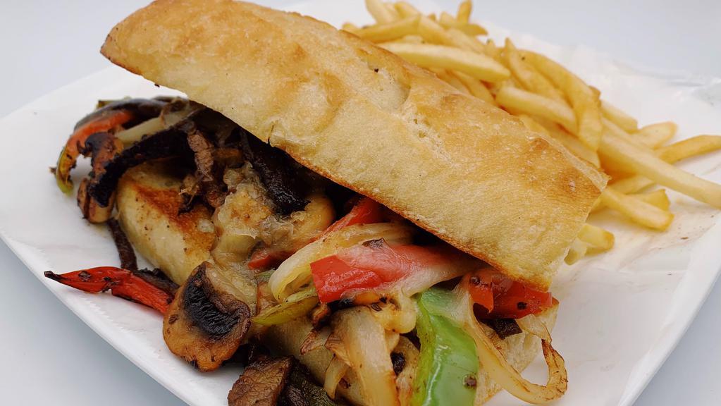 Philly Cheesesteak · Your choice of: beef or chicken. Onions, bell peppers, mushrooms, jalapenos and provolone cheese. Served with fries.