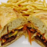 Bahn Mi · Choice of meat. Served with pickled daikon and carrots, sliced jalapenos, onions, cilantro a...