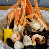 Bucket (4 lb.) · 1 pound each of Mussels, Snow Crab, Shrimp, Clams, sausage, corn and red potatoes.