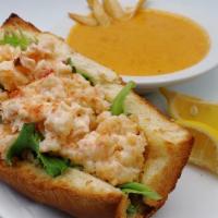 Lobster Roll · East Coast favorite. Diced Maine lobster tossed in butter and mayo mixture served on a hoagi...