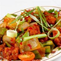 Chilly chicken · Deep fried chicken thigh meat stir fried innt Indo chinese style with onion bell pepper.