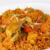 Murgh Shahi Biryani · boneless tandoori chicken cooked with onion tomatoes and spices with perfection