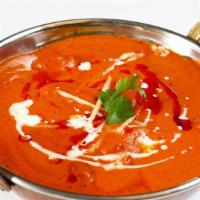 Murgh Tikka Masala · Chicken cooked with tomatoes and signature tikka masala sauce.