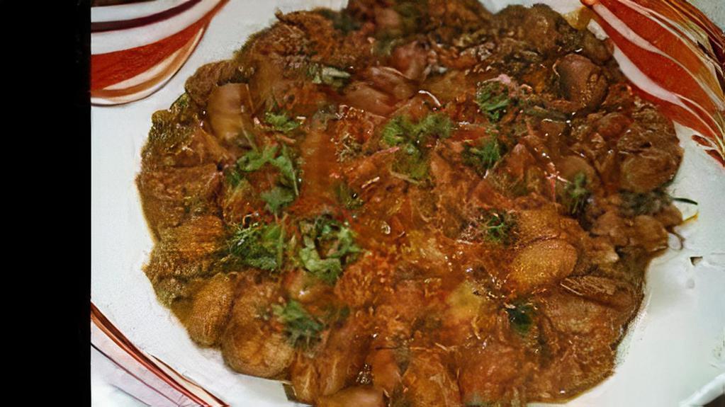 Rajma Gosht · Boneless lamb simmered with spices and red kidney beans.
