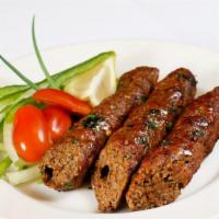 Lamb seekh · Ground lamb cooked in skewer with indian spices.