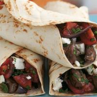 Lamb Wrap · Naan with Lamb, herbs, spices, onions, ginger & garlic
