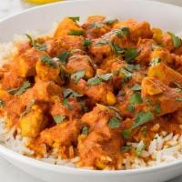 Chicken Curry · Chicken mixed with herbs and spices with tomatoes and onions