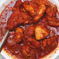 Chicken Vindaloo · Chicken & potatoes cooked with herbs and spices in vindaloo
